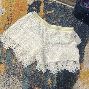 Beautiful white lace shorts for summer for girls ages 5-6 .